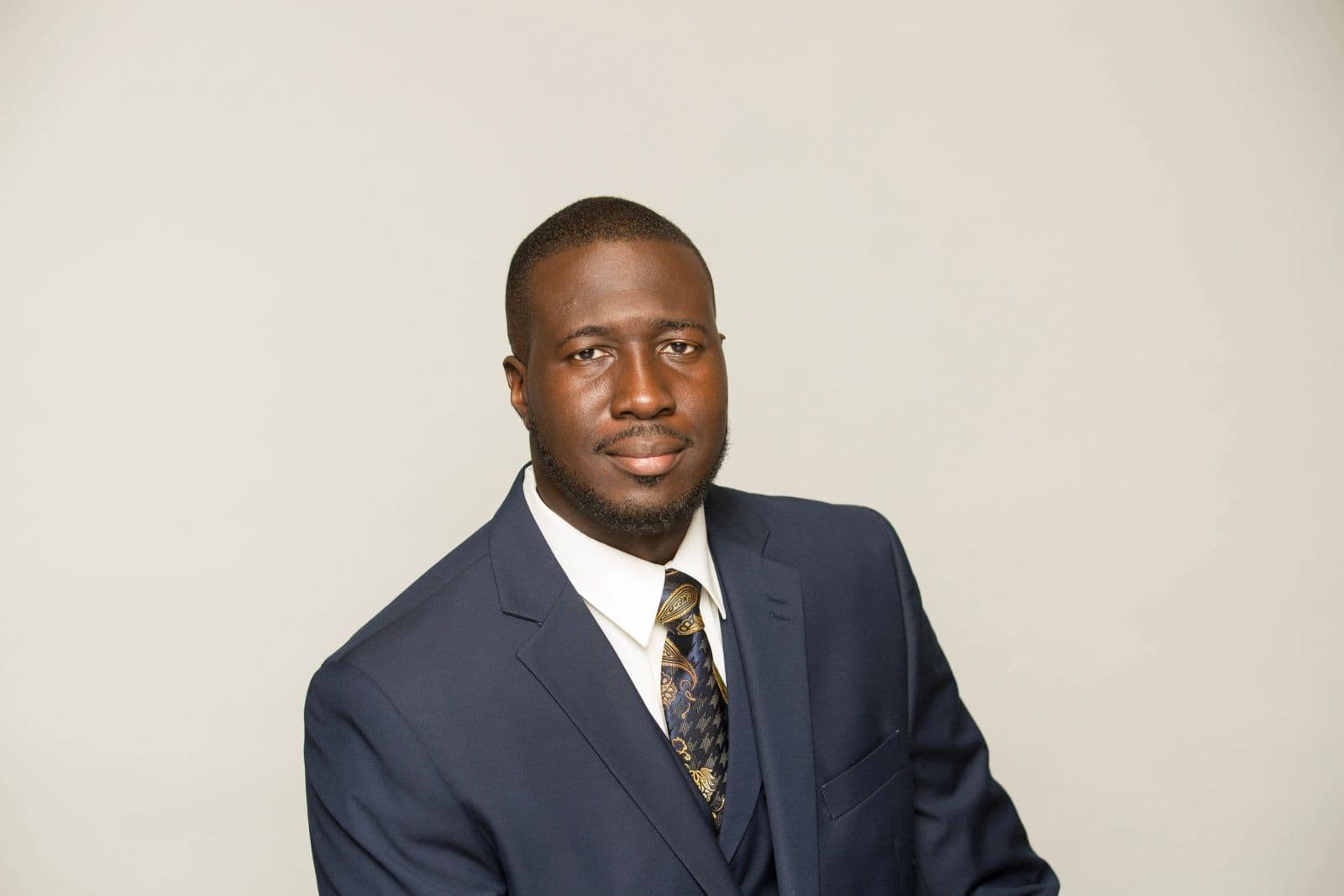 Portrait of David Adams, LPC in a navy suit